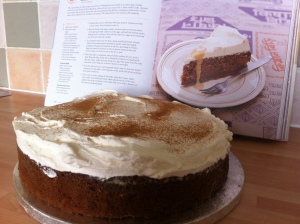 Here is my version of the Choo Choo Chai Cake with the real version photographed in the book behind!